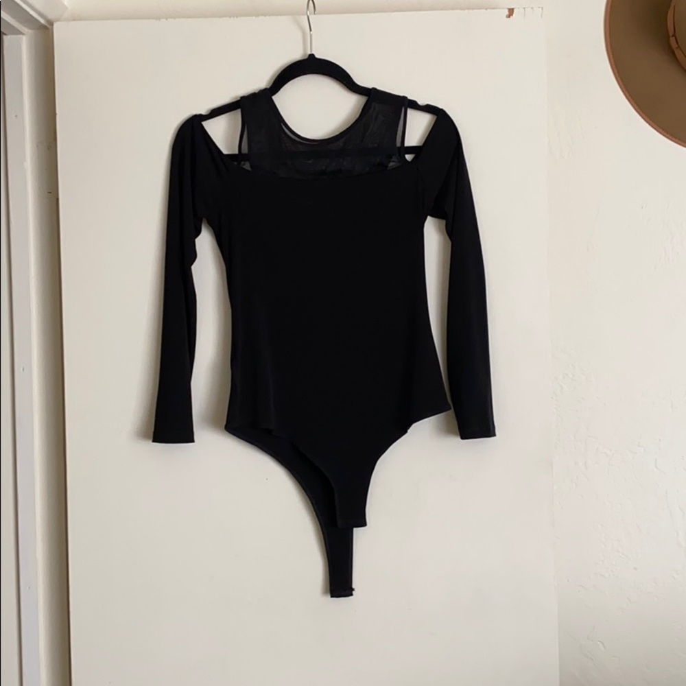 Black cold shoulder bodysuit.